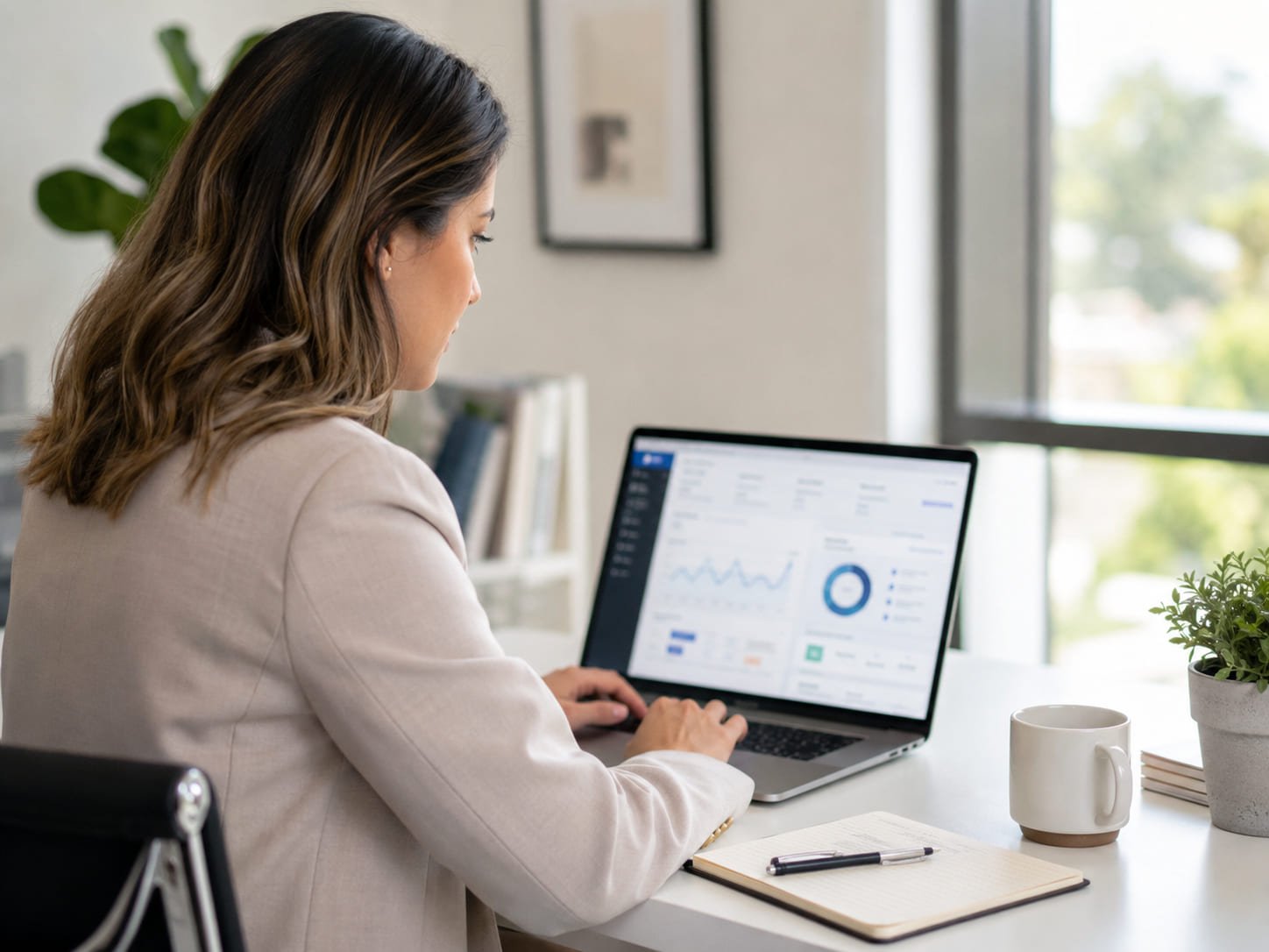 Marketer reviewing a weight loss clinic ad campaign dashboard on a laptop